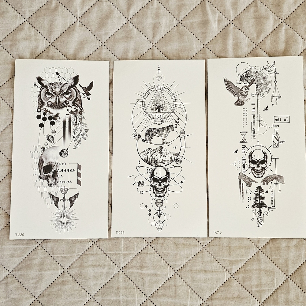 3 large temporary tattoos.  new without tags. Each sheet is 9 inches by 4.75 inc